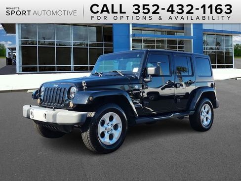 Used 2013 Jeep Wrangler Unlimited Sahara image 1