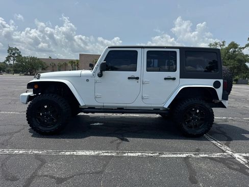 Used 2013 Jeep Wrangler Unlimited Sport w/ Connectivity Group AWD/4WD image 9