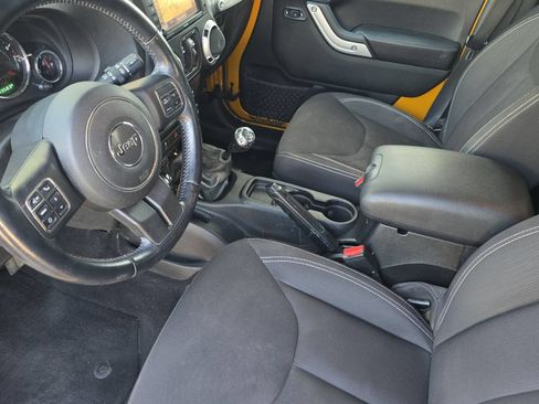 Used 2014 Jeep Wrangler Unlimited Rubicon w/ Dual Top Group AWD/4WD image 10