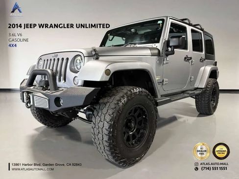 Used 2014 Jeep Wrangler Unlimited Sahara w/ Connectivity Group AWD/4WD image 1