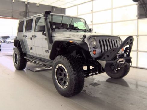 Used 2013 Jeep Wrangler Unlimited Sahara w/ Connectivity Group AWD/4WD image 1