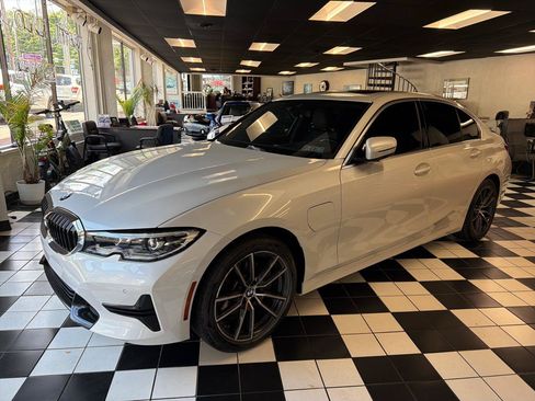 Used 2021 BMW 330e xDrive w/ Premium Package AWD/4WD image 1