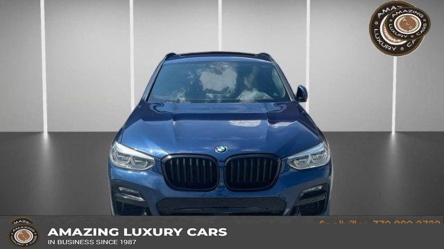 Used 2021 BMW X4 M40i w/ Executive Package AWD/4WD image 1