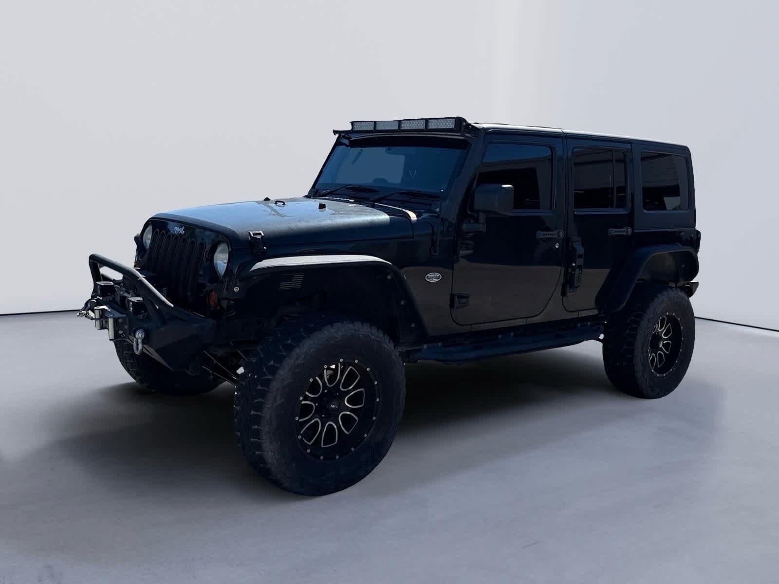 Used 2012 Jeep Wrangler Unlimited Sport AWD/4WD image 1