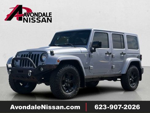 Used 2015 Jeep Wrangler Unlimited Sahara AWD/4WD image 1