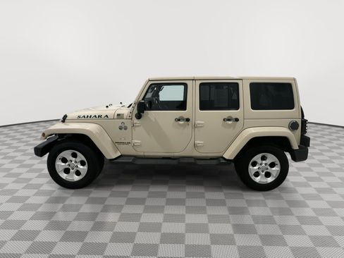 Used 2011 Jeep Wrangler Unlimited Sahara w/ Connectivity Group AWD/4WD image 2