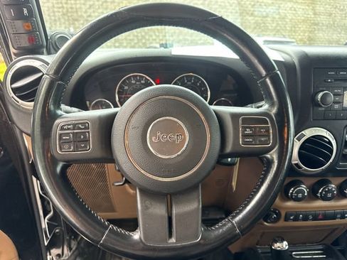 Used 2012 Jeep Wrangler Unlimited Sahara w/ Dual Top Group AWD/4WD image 17
