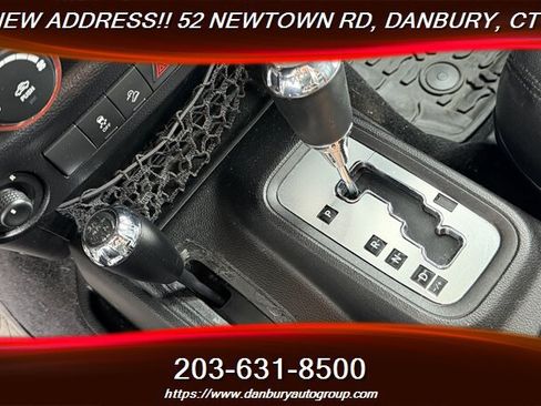 Used 2014 Jeep Wrangler Unlimited Sahara w/ Dual Top Group AWD/4WD image 17