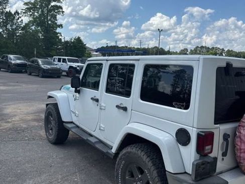 Used 2012 Jeep Wrangler Unlimited Sahara AWD/4WD image 6