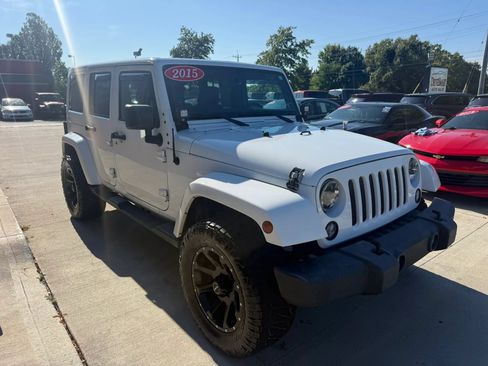 Used 2015 Jeep Wrangler Unlimited Sahara w/ Dual Top Group AWD/4WD image 2
