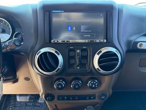Used 2012 Jeep Wrangler Unlimited Rubicon w/ Dual Top Group AWD/4WD image 11