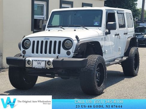 Used 2014 Jeep Wrangler Unlimited Sahara w/ Dual Top Group AWD/4WD image 3