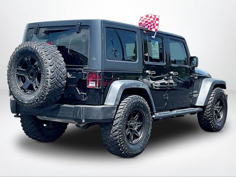 Used 2016 Jeep Wrangler Unlimited Sport w/ Mopar Black Appearance Group AWD/4WD image 3