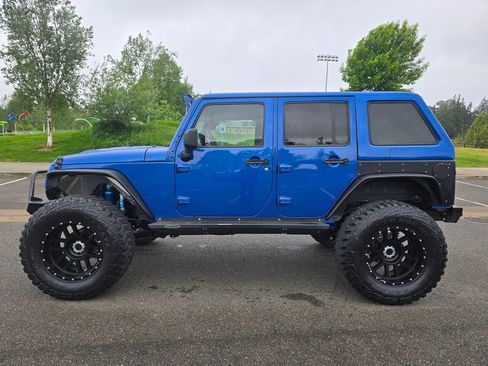 Used 2014 Jeep Wrangler Unlimited Sport AWD/4WD image 2