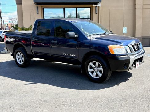 Used 2010 Nissan Titan SE AWD/4WD image 1