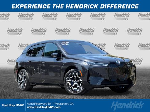 Used 2024 BMW iX xDrive50 w/ Premium Package AWD/4WD image 1