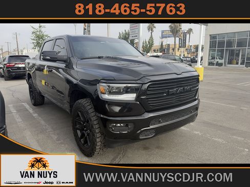 Used 2024 RAM 1500 Laramie AWD/4WD image 1