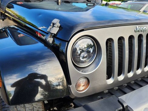 Used 2014 Jeep Wrangler Unlimited Sport AWD/4WD image 23