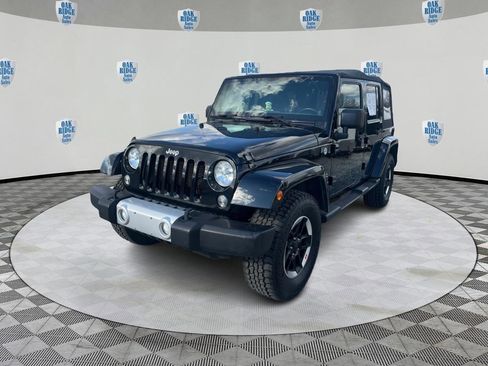 Used 2014 Jeep Wrangler Unlimited Sahara w/ Connectivity Group AWD/4WD image 1