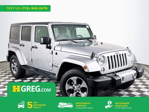 Used 2016 Jeep Wrangler Unlimited Sahara w/ Dual Top Group image 1