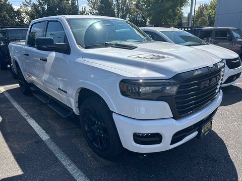 Used 2025 RAM 1500 Laramie w/ Night Edition AWD/4WD image 1
