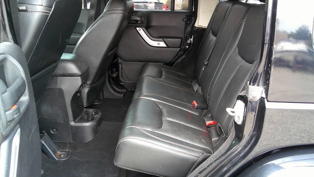 Used 2014 Jeep Wrangler Unlimited Sahara w/ Dual Top Group AWD/4WD image 12