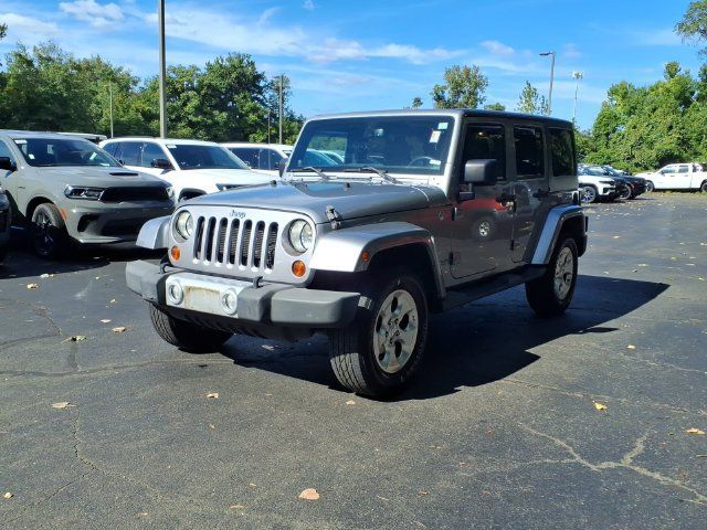 Used 2013 Jeep Wrangler Unlimited Sahara w/ Dual Top Group AWD/4WD image 3