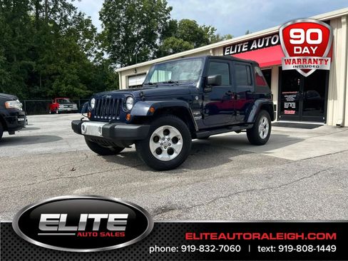 Used 2013 Jeep Wrangler Unlimited Sahara w/ Dual Top Group image 1