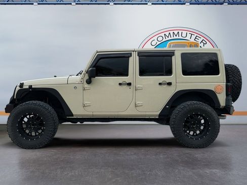 Used 2011 Jeep Wrangler Unlimited Sahara w/ Connectivity Group AWD/4WD image 3