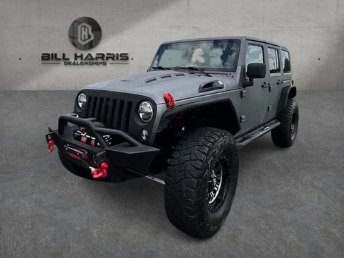 Used 2016 Jeep Wrangler Unlimited Sahara w/ Dual Top Group AWD/4WD image 1