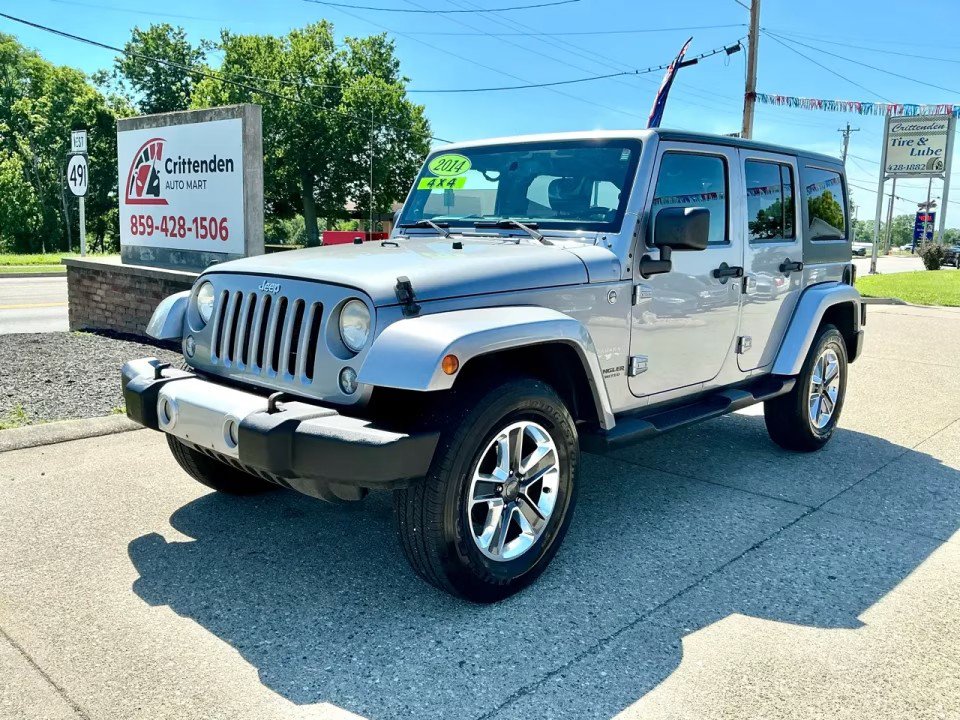 Used 2014 Jeep Wrangler Unlimited Sahara AWD/4WD image 1