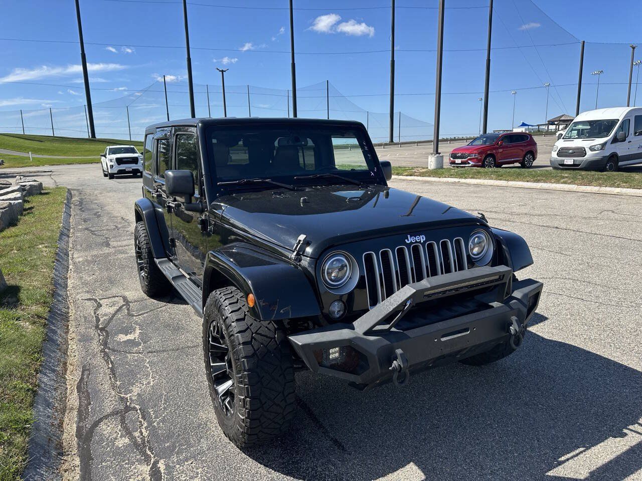 Used 2016 Jeep Wrangler Unlimited Sahara w/ Dual Top Group AWD/4WD image 14