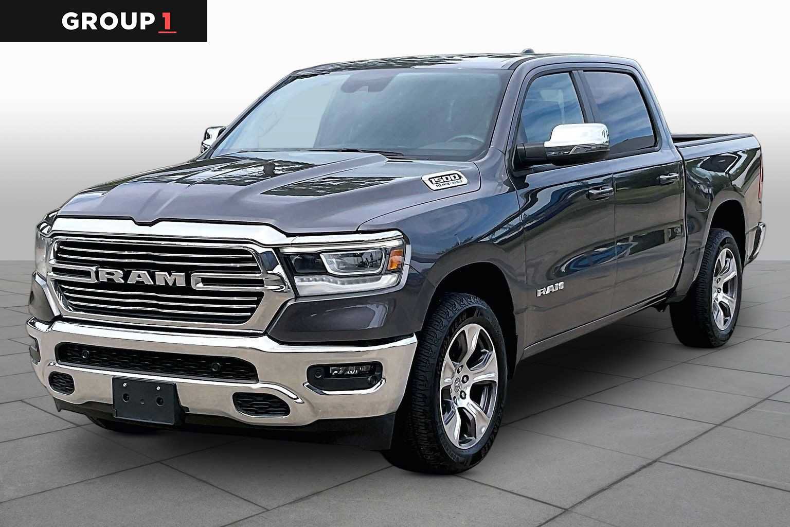 Used 2024 RAM 1500 Laramie AWD/4WD image 1