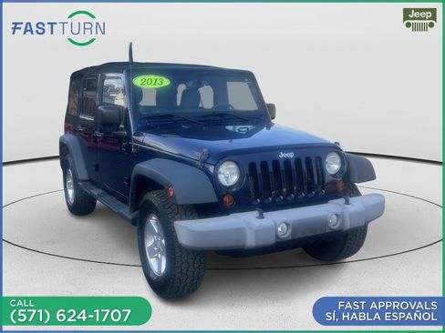 Used 2013 Jeep Wrangler Unlimited Sport AWD/4WD image 1
