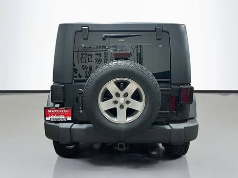Used 2010 Jeep Wrangler Unlimited Rubicon w/ Dual Top Group image 7