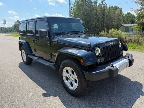Used 2014 Jeep Wrangler Unlimited Sahara w/ Max Tow Package image 4