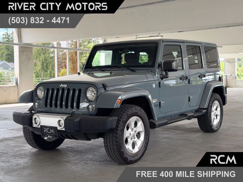 Used 2014 Jeep Wrangler Unlimited Sahara w/ Connectivity Group AWD/4WD image 1