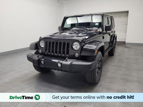 Used 2015 Jeep Wrangler Unlimited Sahara image 1