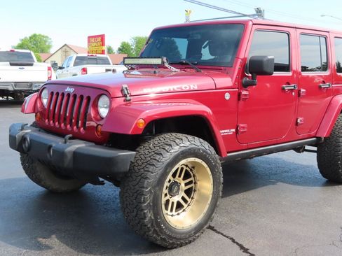 Used 2013 Jeep Wrangler Unlimited Rubicon w/ Dual Top Group AWD/4WD image 10