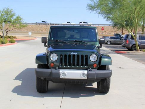 Used 2010 Jeep Wrangler Unlimited Sahara w/ Mopar Chrome Edition Group AWD/4WD image 2