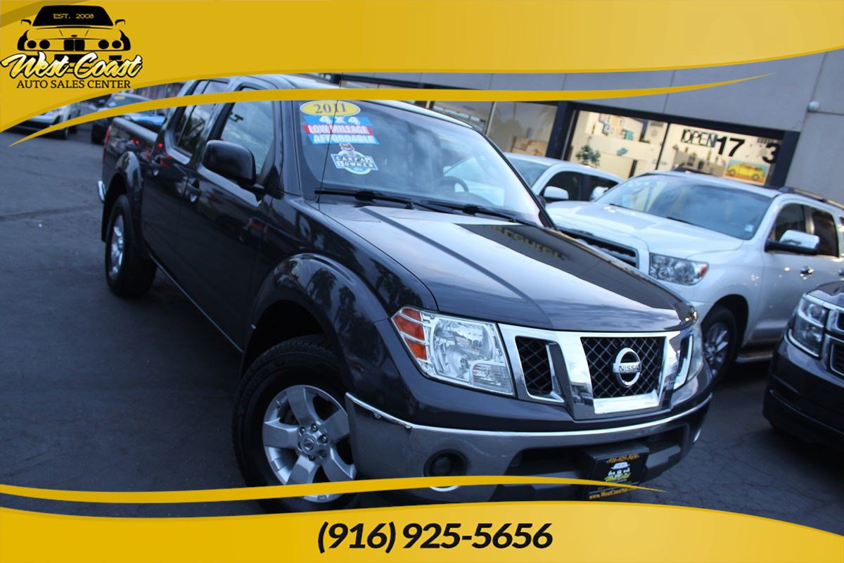 Used 2011 Nissan Frontier SV w/ SV Premium Utility Pkg AWD/4WD image 1