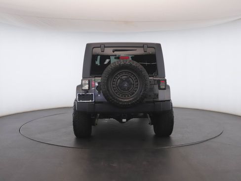 Used 2014 Jeep Wrangler Unlimited Sahara w/ Dual Top Group AWD/4WD image 19