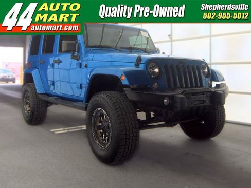 Used 2016 Jeep Wrangler Unlimited Sahara AWD/4WD image 1