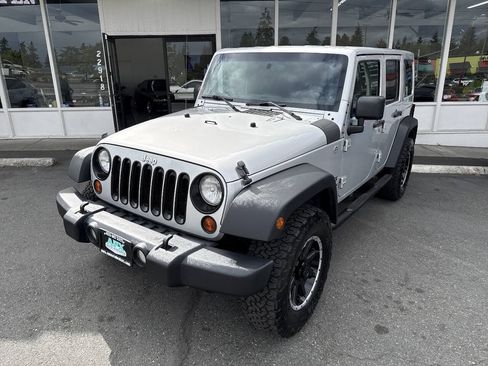 Used 2011 Jeep Wrangler Unlimited Sport AWD/4WD image 1