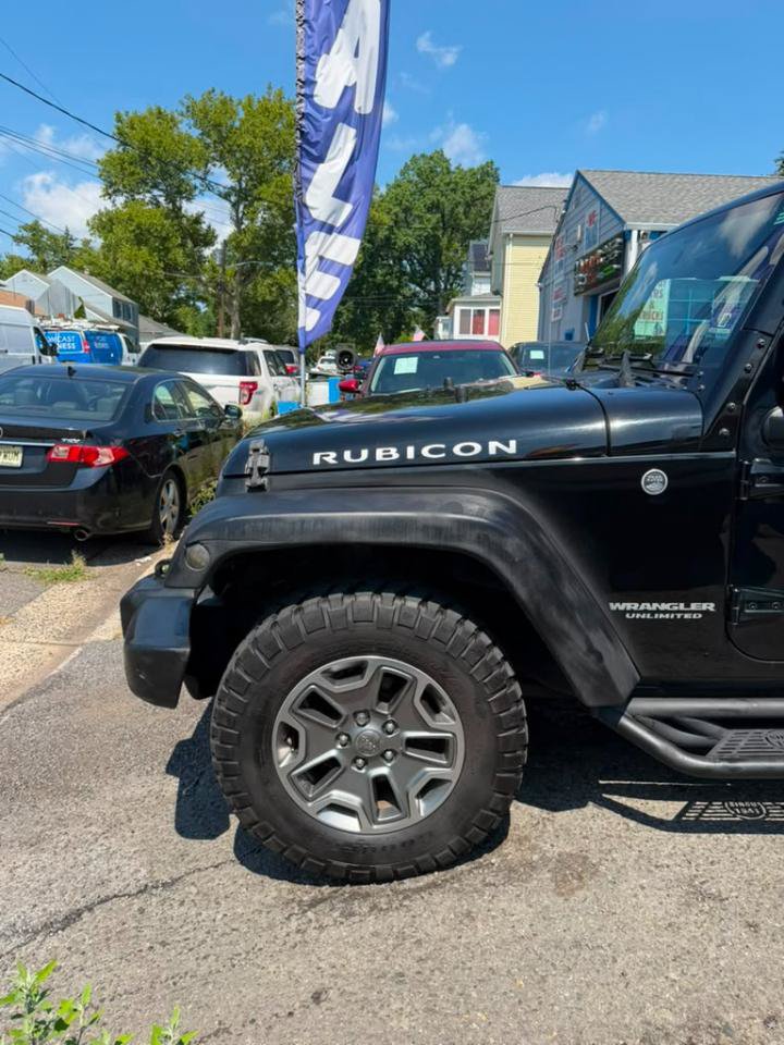 Used 2016 Jeep Wrangler Unlimited Rubicon w/ Dual Top Group AWD/4WD image 14