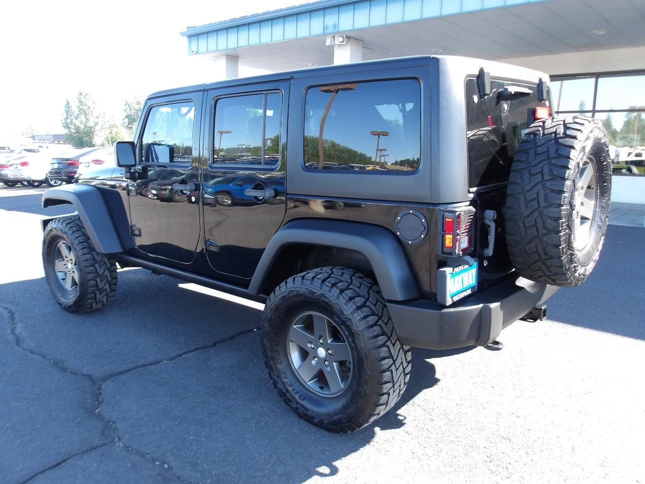 Used 2011 Jeep Wrangler Unlimited Rubicon w/ Dual Top Group AWD/4WD image 3