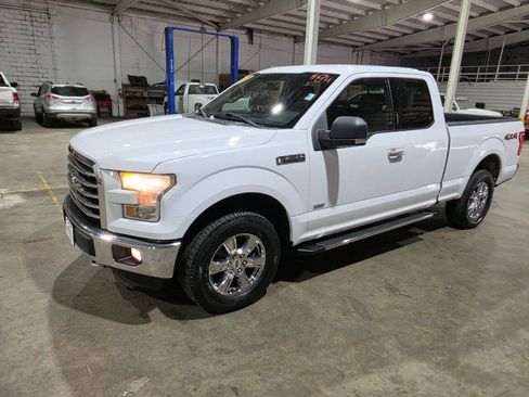Used 2015 Ford F150 XLT w/ Equipment Group 302A Luxury AWD/4WD image 1
