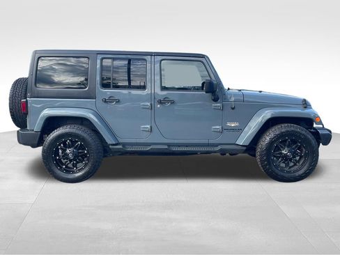 Used 2014 Jeep Wrangler Unlimited Sahara w/ Dual Top Group AWD/4WD image 8