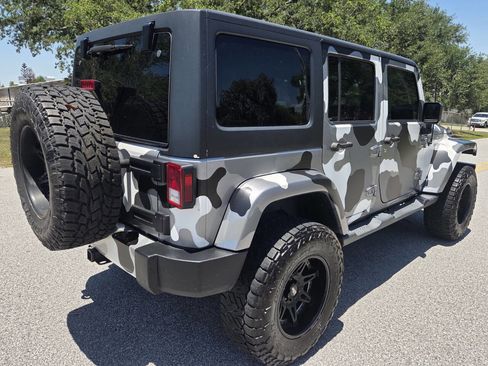 Used 2015 Jeep Wrangler Unlimited Sahara w/ Max Tow Package AWD/4WD image 12