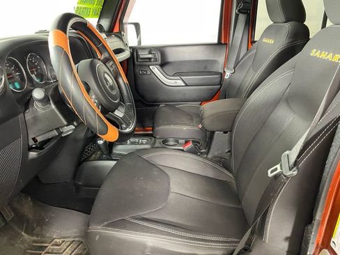 Used 2014 Jeep Wrangler Unlimited Sahara w/ Dual Top Group AWD/4WD image 2